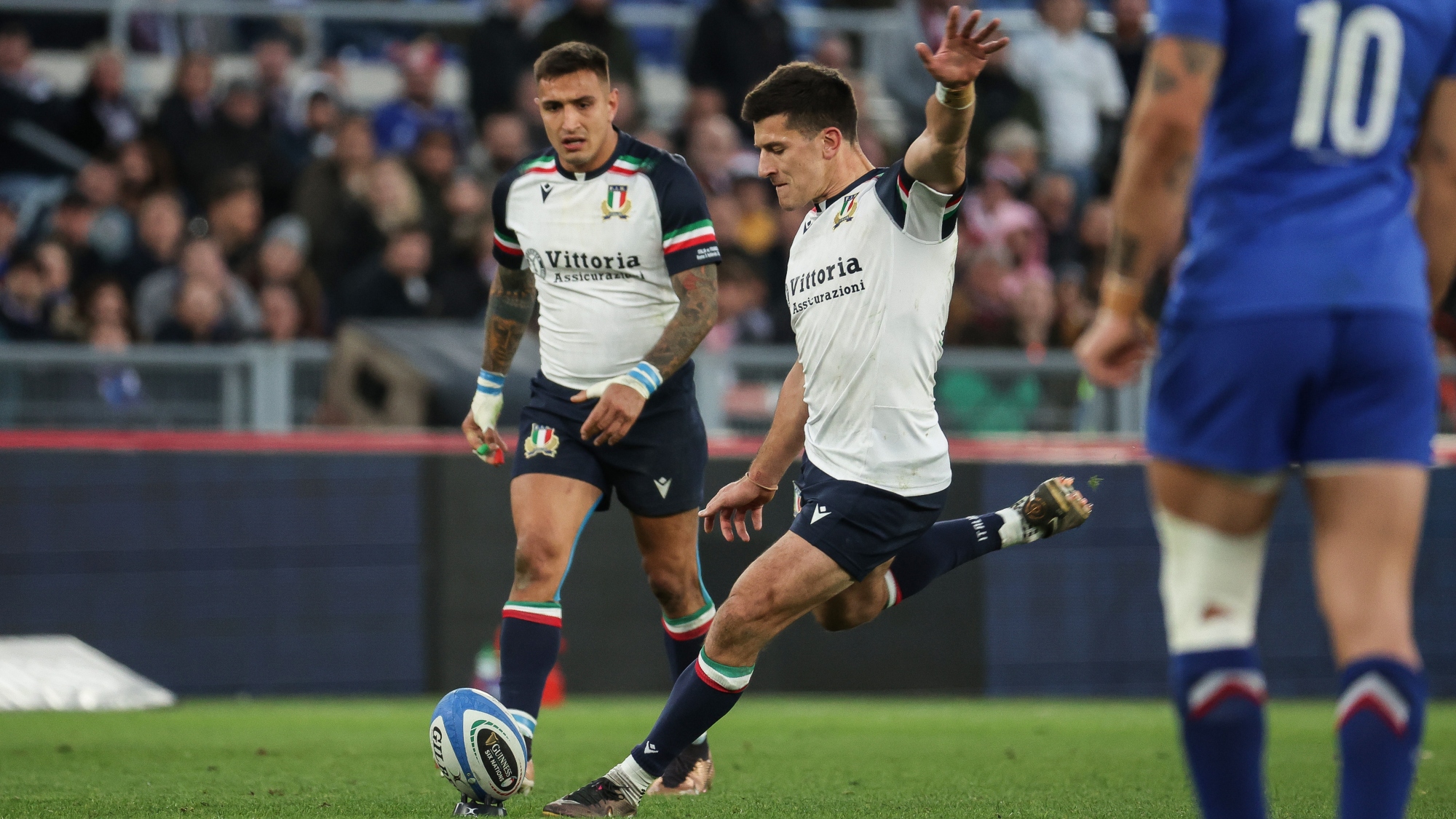 Tommaso Allan kicking a penalty for Italy against France
